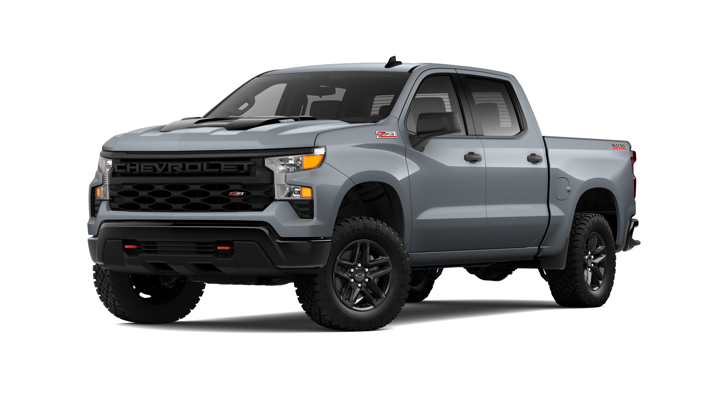 Chevrolet Silverado Custom Trail Boss navigating a rocky off-road trail